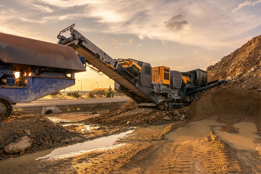 Heavy and mobile machinery in a quarry as Canada's construction boom